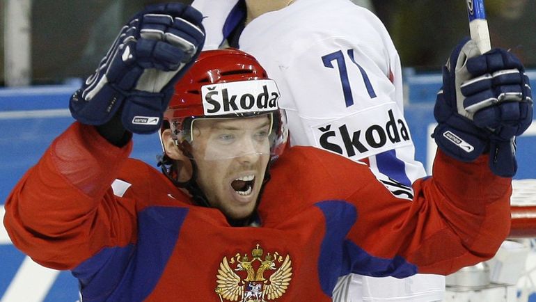 Сергей МОЗЯКИН (в красном). Фото AFP Сергей МОЗЯКИН (в красном). Фото AFP