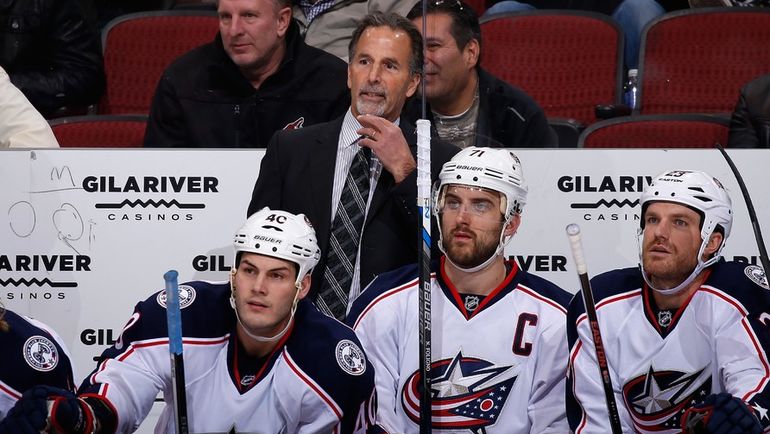 ДЖОН ТОРТОРЕЛЛА (в центре на втором плане). Фото AFP ДЖОН ТОРТОРЕЛЛА (в центре на втором плане). Фото AFP