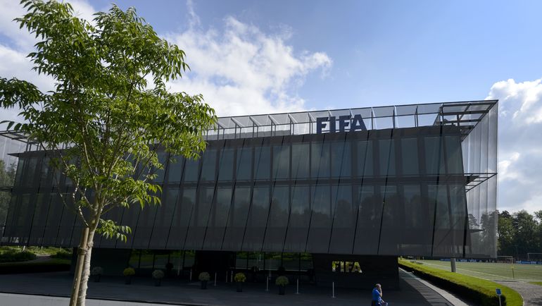 ФИФА опубликовала доклад о получении Россией и Катаром чемпионатов мира-2018 и 2022. Фото AFP ФИФА опубликовала доклад о получении Россией и Катаром чемпионатов мира-2018 и 2022. Фото AFP