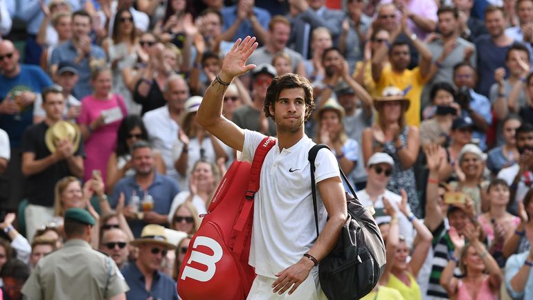 Карен ХАЧАНОВ, несмотря на поражение, может занести Уимблдон себе в актив. Фото AFP Карен ХАЧАНОВ, несмотря на поражение, может занести Уимблдон себе в актив. Фото AFP