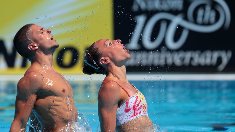 Выступление чемпионов - Манилы ФЛАМИНИ (справа) и Джорджо МИНИЗИНИ. Фото AFP Выступление чемпионов - Манилы ФЛАМИНИ (справа) и Джорджо МИНИЗИНИ. Фото AFP