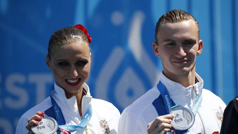 Михаэла КАЛАНЧА и Александр МАЛЬЦЕВ с серебром ЧМ. Фото REUTERS Михаэла КАЛАНЧА и Александр МАЛЬЦЕВ с серебром ЧМ. Фото REUTERS