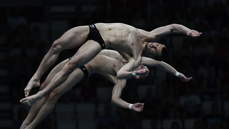 Россиянин Виктор МИНИБАЕВ не считает идею исключить из синхронных прыжков обязательные реальной. Фото REUTERS Россиянин Виктор МИНИБАЕВ не считает идею исключить из синхронных прыжков обязательные реальной. Фото REUTERS