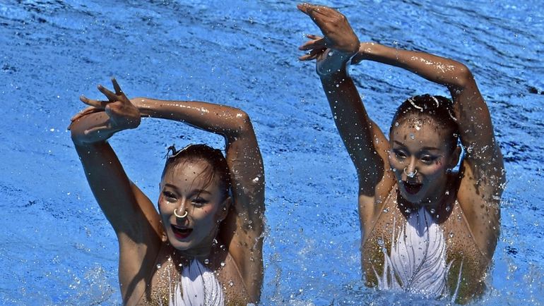 Китаянки Тинтин (слева) и Вэньвэнь ЦЗЯН. Фото AFP Китаянки Тинтин (слева) и Вэньвэнь ЦЗЯН. Фото AFP