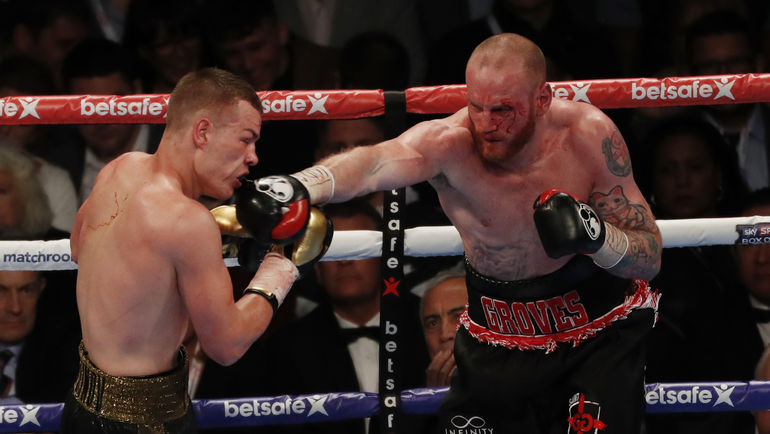 Федор ЧУДИНОВ (слева) в бою с Джорджем ГРОУВЗОМ. Фото REUTERS Федор ЧУДИНОВ (слева) в бою с Джорджем ГРОУВЗОМ. Фото REUTERS