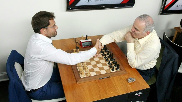 Гарри КАСПАРОВ (справа) и Левон АРОНЯН. Фото AFP Гарри КАСПАРОВ (справа) и Левон АРОНЯН. Фото AFP