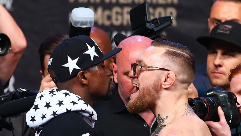 Флойд МЕЙВЕЗЕР и Конор МАКГРЕГОР. Фото AFP Флойд МЕЙВЕЗЕР и Конор МАКГРЕГОР. Фото AFP