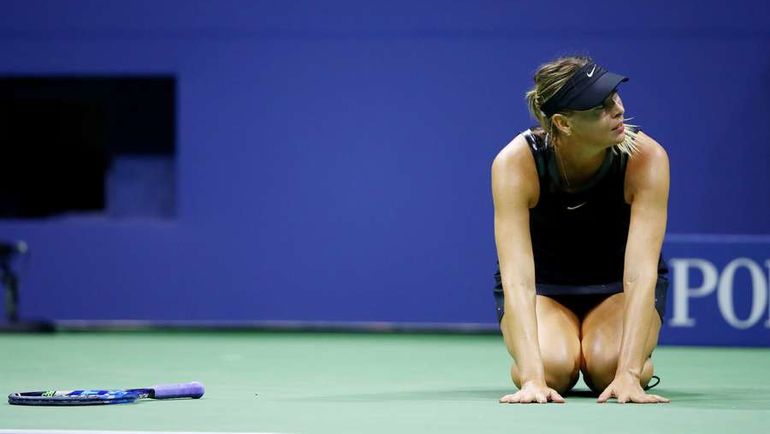 Реакция Марии ШАРАПОВОЙ после победы над Симоной Халеп. Фото AFP Реакция Марии ШАРАПОВОЙ после победы над Симоной Халеп. Фото AFP