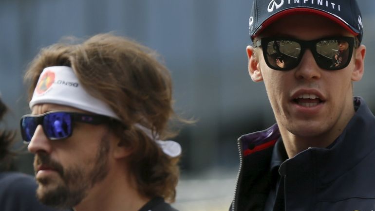 Фернандо АЛОНСО (слева) и Даниил КВЯТ. Фото AFP Фернандо АЛОНСО (слева) и Даниил КВЯТ. Фото AFP