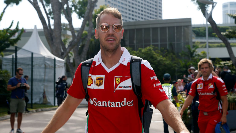 Никто из действующих пилотов не побеждал в Сингапуре чаще Себастьяна ФЕТТЕЛЯ. Фото REUTERS Никто из действующих пилотов не побеждал в Сингапуре чаще Себастьяна ФЕТТЕЛЯ. Фото REUTERS