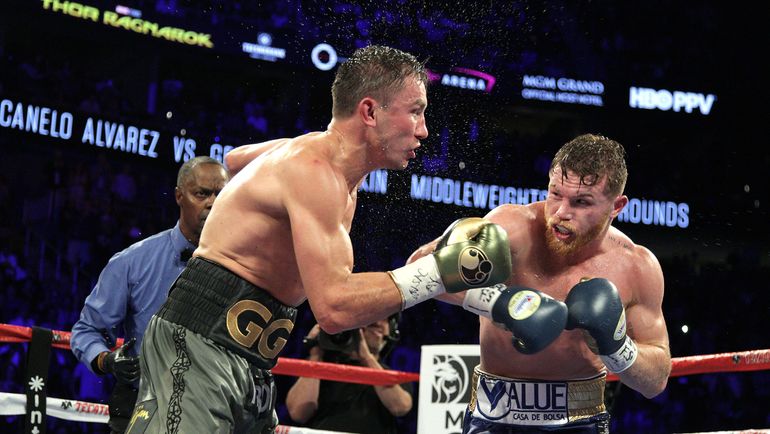 Сауль АЛЬВАРЕС (справа) против Геннадия ГОЛОВКИНА. Фото AFP Сауль АЛЬВАРЕС (справа) против Геннадия ГОЛОВКИНА. Фото AFP