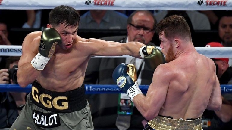 Геннадий ГОЛОВКИН (слева) против Сауля АЛЬВАРЕСА. Фото AFP Геннадий ГОЛОВКИН (слева) против Сауля АЛЬВАРЕСА. Фото AFP