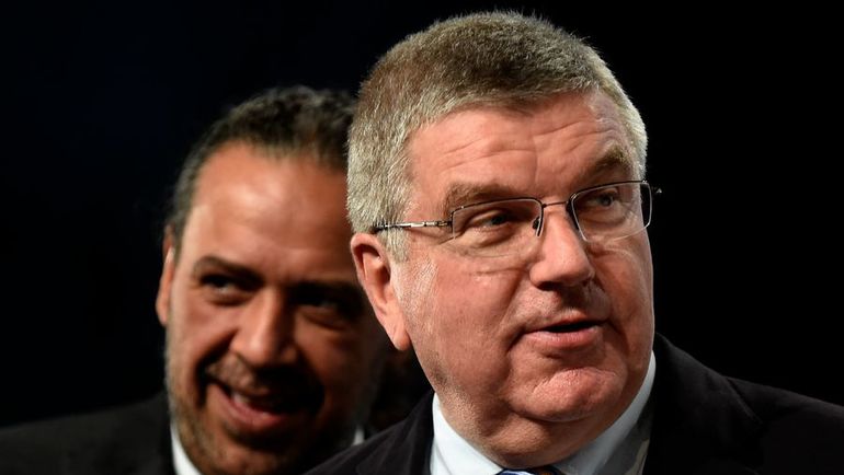 Глава МОК Томас БАХ (справа). Фото AFP Глава МОК Томас БАХ (справа). Фото AFP