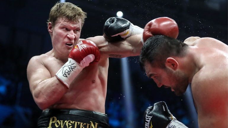 15 декабря. Екатеринбург. Александр ПОВЕТКИН (слева) победил Кристиана ХАММЕРА и защитил титул чемпиона WBO International в тяжелом весе. Фото ТАСС 15 декабря. Екатеринбург. Александр ПОВЕТКИН (слева) победил Кристиана ХАММЕРА и защитил титул чемпиона WBO International в тяжелом весе. Фото ТАСС