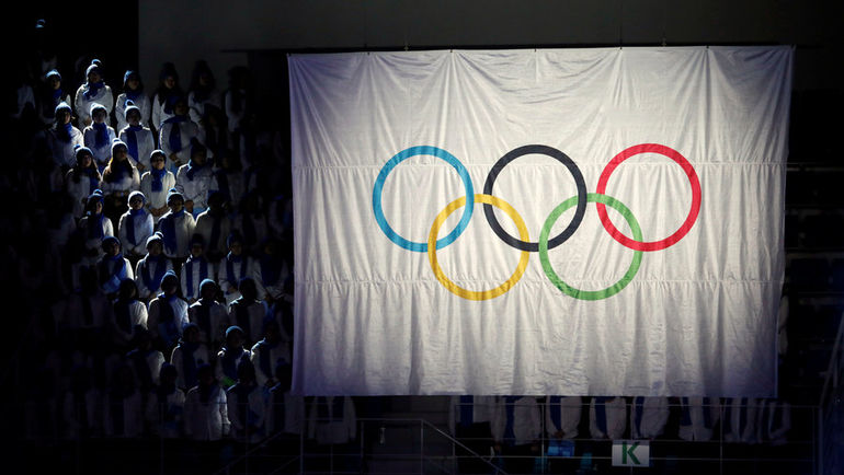 Олимпийский флаг. Фото REUTERS Олимпийский флаг. Фото REUTERS