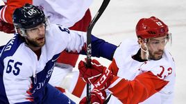 Среда. Пхенчхан. Словакия - Россия - 3:2. Павел ДАЦЮК (справа) и Томаш МАРЦИНКО.