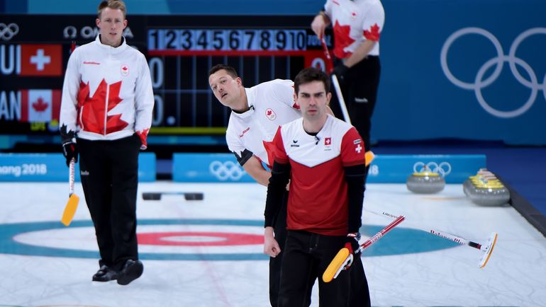 Керлингисты сборной Канады. Фото AFP Керлингисты сборной Канады. Фото AFP