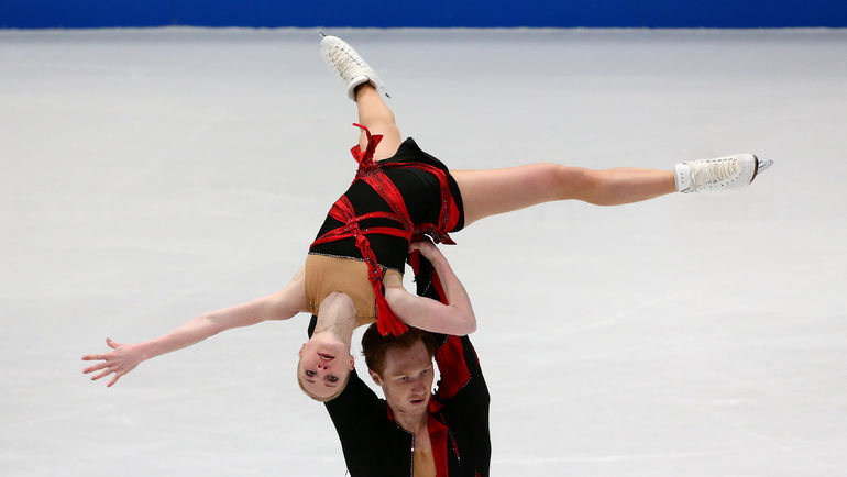 Вчера. Милан. Евгения ТАРАСОВА и Владимир МОРОЗОВ на чемпионате мира. Фото REUTERS Вчера. Милан. Евгения ТАРАСОВА и Владимир МОРОЗОВ на чемпионате мира. Фото REUTERS
