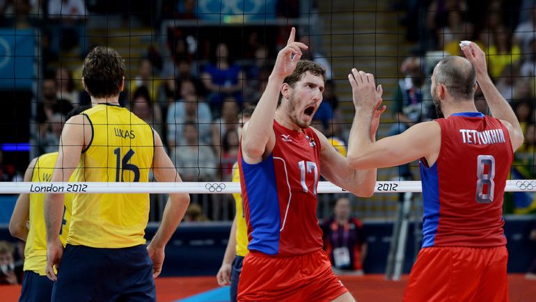 12 августа 2012 года. Лондон. Олимпиада. Финал. Россия - Бразилия - 3:2. Сергей ТЕТЮХИН (справа) и Максим МИХАЙЛОВ. Фото AFP 12 августа 2012 года. Лондон. Олимпиада. Финал. Россия - Бразилия - 3:2. Сергей ТЕТЮХИН (справа) и Максим МИХАЙЛОВ. Фото AFP