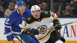 Брэд МАРШАН.