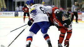 Капитан сборной Канады Коннор МАКДЭВИД (№97).