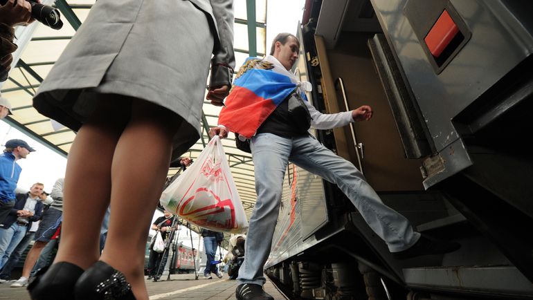 Пассажиры на Белорусском вокзале. Фото AFP Пассажиры на Белорусском вокзале. Фото AFP