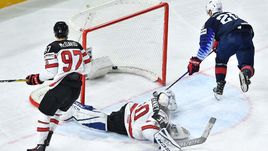 Сегодня. Копенгаген. США – Канада – 4:1. Канадцы Коннор МАКДЭВИД и Кертис МАКЭЛХИНН не смогли помешать американца Крису КРАЙДЕРУ открыть счет.