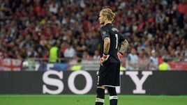 Лорис КАРИУС.