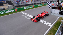 Воскресенье. Монреаль. Финиш "Феррари" Себастьяна ФЕТТЕЛЯ.