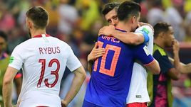 Воскресенье. Казань. Польша – Колумбия – 0:3. Мачей РЫБУС, Хамес РОДРИГЕС и Роберт ЛЕВАНДОВСКИ (слева направо) после матча.