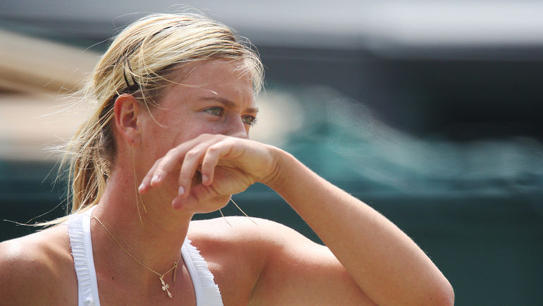 2007 год. Лондон. Мария ШАРАПОВА в матче против Винус УИЛЬЯМС. Фото AFP 2007 год. Лондон. Мария ШАРАПОВА в матче против Винус УИЛЬЯМС. Фото AFP