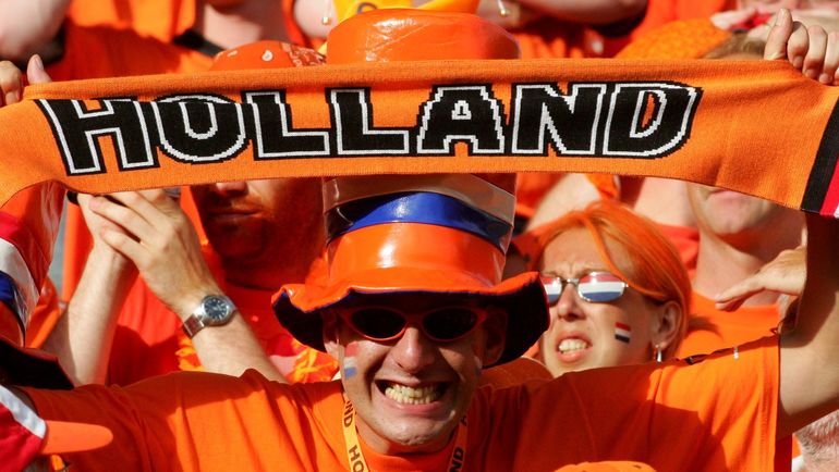 Голландский болельщики. Фото REUTERS Голландский болельщики. Фото REUTERS