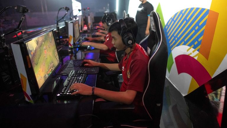 28 августа. Индонезия. Джакарта. Турнир по киберспорту в рамках Азиатских игр. Фото AFP 28 августа. Индонезия. Джакарта. Турнир по киберспорту в рамках Азиатских игр. Фото AFP