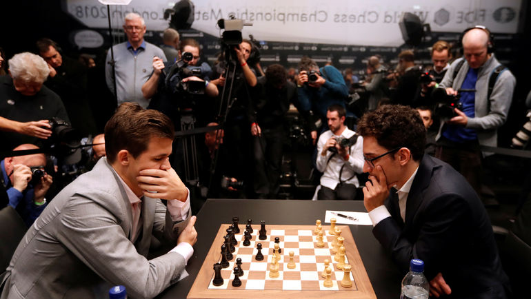 Магнус Карлсен и Фабиано Каруана. Фото REUTERS Магнус Карлсен и Фабиано Каруана. Фото REUTERS