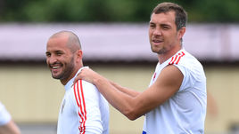 6 июля 2018 года. Сочи. Федор Кудряшов (слева) и Артем Дзюба на тренировке сборной России перед матчем 1/4 финала чемпионата мира с Хорватией.