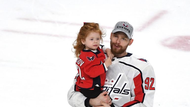 Евгений Кузнецов с дочерью. Фото AFP Евгений Кузнецов с дочерью. Фото AFP