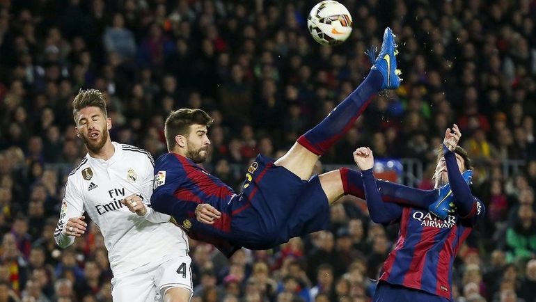 Серхио Рамос (слева) и Жерар Пике (в центре). Фото REUTERS Серхио Рамос (слева) и Жерар Пике (в центре). Фото REUTERS