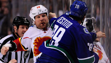 Брайан Макгрэттан.