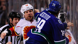 Брайан Макгрэттан.