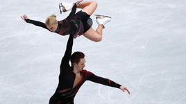 20 марта. Сайтама. Евгения Тарасова и Владимир Морозов установили мировой рекорд в короткой программе и захватили лидерство на чемпионате мира.