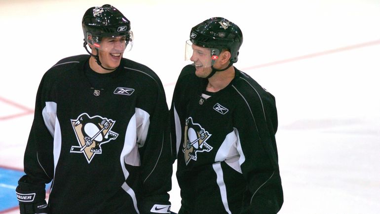 Евгений Малкин и Сергей Гончар. Фото REUTERS Евгений Малкин и Сергей Гончар. Фото REUTERS