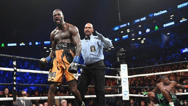 Деонтей Уайлдер (слева) против Луиса Ортиза. Фото AFP Деонтей Уайлдер (слева) против Луиса Ортиза. Фото AFP