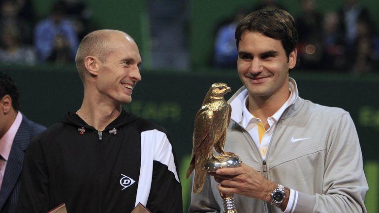 Николай Давыденко и Роджер Федерер. Фото REUTERS Николай Давыденко и Роджер Федерер. Фото REUTERS