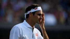 10 июля. Лондон. Роджер Федерер – Кеи Нишикори – 4:6, 6:1, 6:4, 6:4. Швейцарец после одного из розыгрышей.