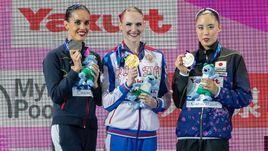 Светлана Ромашина (в центре), Она Карбонель (слева) и Юкико Инуи.