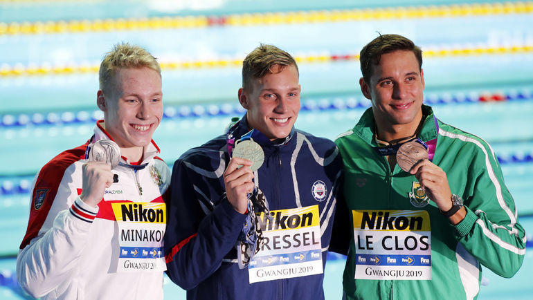 Андрей Минаков (слева), Кэлеб Дрессел (в центре) и Чэд ле Кло. Фото REUTERS Андрей Минаков (слева), Кэлеб Дрессел (в центре) и Чэд ле Кло. Фото REUTERS