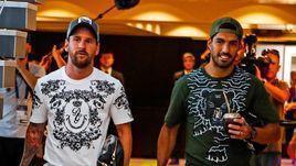 Лионель Месси и Луис Суарес.