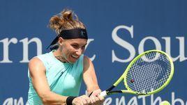 Кузнецова без титула, но с улыбкой