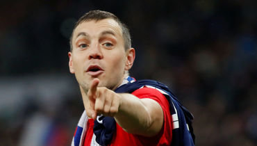 Капитан сборной России нападающий Артем Дзюба.