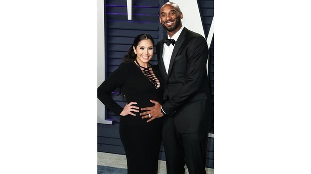 Коби Брайант и его жена Ванесса. Коби Брайант и его жена Ванесса.